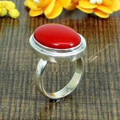 About The Ring:- 925 Sterling Silver Unisex Ring Chinese Red Coral Gemstone Ring Handmade Ring Spiritual Ring Western Ring Girls Gift Ring Engagement Jewelry Description : Gemstone : Synthetic Red Coral Stone Size : 19 x 14 MM Approx Stone Shape :- Oval Stamp :- 925 Weight : 8.37 Gram Approx handmade Item Made to order Processing Time :- This is handmade item and we need 3-5 days to ship your order . Delivery Time :- Once Item is shipped parcel will delivered to you in 2-4 weeks . Red Sterling Silver Round Rings, Red Gemstone Rings In Sterling Silver, Ruby Ring With Polished Finish As Gift, Red Open Ring Stamped 925, Red Sterling Silver Open Ring, Red Open Ring For Jewelry Making, Unique Red Sterling Silver Rings, Handmade Red Sterling Silver Rings, Unique Red Ring With Polished Finish