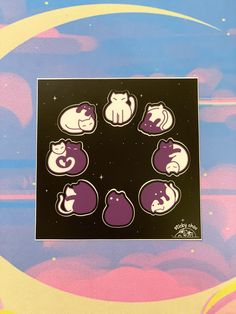 six cats stickers in the shape of a circle on a blue and pink background