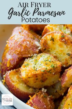 air fryer garlic parmesan potatoes in a white bowl with text overlay