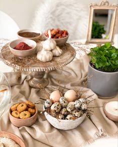 an assortment of food is displayed on a table