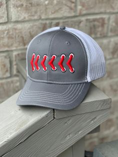 Embroidered raised baseball stitches hat Gray Snapback Hat For Baseball Season With Curved Bill, Gray Curved Bill Snapback Hat For Baseball Season, Gray Curved Brim Snapback Hat For Baseball Season, Gray Curved Brim Snapback Hat For Baseball, Sporty Gray Hat For Baseball Season, Gray Hats For Baseball Season, Embroidered Curved Bill Baseball Cap For Baseball Season, Embroidered Logo Trucker Hat For Baseball Season, Baseball Stitch