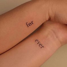 two wrist tattoos with the words for ever written on them