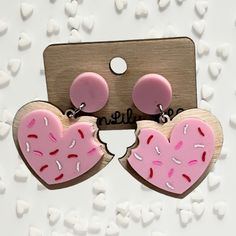 "These cute Valentine's Day cookie earrings with a bite taken out are are made from 1/8\" birch wood and acrylic. They are about 2\" and made from hypoallergenic posts. Comes with two styles of backing." Kawaii Earrings, White Studs, Valentines Day Cookies, Heart Earrings, Earring Gifts, Sprinkles, Cookies Et Biscuits, Red And White, Jewelry Earrings Dangle