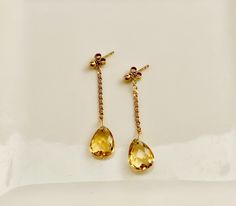 Delicate, feminine and so gorgeous! This is an 18k Gold Filled Earrings featuring a beautiful polished Citrine gemstone. You can see how clear is this stone’s cut. Amazing! Citrine is a great gem to wear to increase motivation! You will love how it will match a lot of your outfits! Product Details: . Size: 2” . Material: 18k Gold Filled Elegant Teardrop Citrine Jewelry, Elegant Formal Citrine Earrings, Elegant Drop Citrine Earrings, Elegant Citrine Faceted Earrings, Elegant Faceted Citrine Earrings, Elegant Citrine Earrings For Wedding, Elegant Citrine Drop Earrings, Elegant Citrine Teardrop Earrings, Elegant Teardrop Citrine Earrings