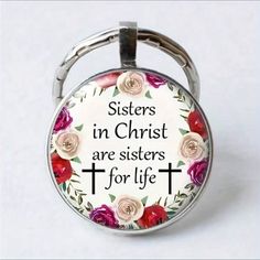 a key chain with a quote on it that says sisters in christ are sisters for life