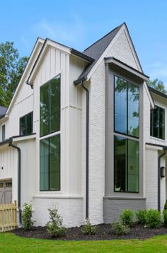 a large white house with lots of windows