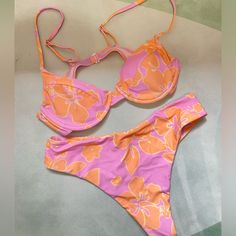 Never Worn Pink Summer Swimwear For Poolside, Pink Beachy Swimwear For Poolside, Pink Tropical Swimwear For Spring, Tropical Pink Swimwear For Spring, Pink Floral Print Swimwear For Pool, Spring Pink Swimwear For Poolside, Pink Swimwear For Poolside Spring Occasion, Pink Swimwear For Spring Poolside, Pink Summer Swimwear For Beach Party