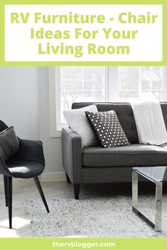 a living room with grey couches and black chairs in front of a white window