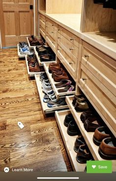 the shoes are lined up on the drawers in the walk - in closet for storage