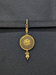 Please allow some variation in color. Length from hook: 3.75 inches. Width: 1.5 inches. Base material is copper alloy with light gold plating. Low height Large size Round Tikka. Luxury Bollywood Tilla Tikka, Luxury Meenakari Tikka As Gift, Elegant Luxury Tikka For Diwali, Luxury Traditional Tikka For Festivals, Luxury Gold Tikka As Gift, Elegant Luxury Tikka As A Gift, Luxury Bollywood Tikka For Diwali, Luxury Traditional Women's Tikka, Luxury Gold Ceremonial Tikka