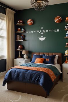 a football themed bedroom with green walls and blue bedding