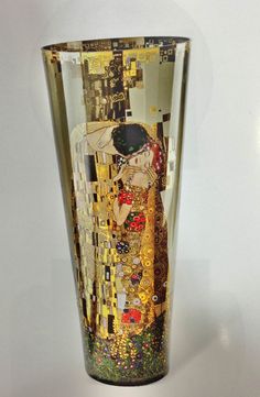 a glass with an artistic painting on it