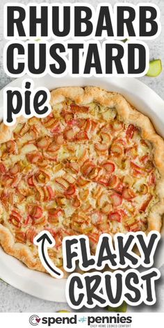 a pizza sitting on top of a white plate next to a sign that says rhubarb custard pie