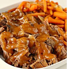 slow cooker balsamic pot roast with carrots and potatoes in a white bowl