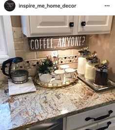 a kitchen counter with coffee mugs and other items on it that says coffee anyone?