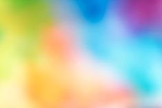 a blurry image of multicolored colors