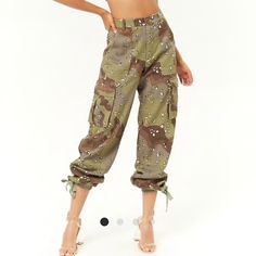 Cargo Pants Spring Sweatpants Cargo Style Straight Leg, Spring Utility Pants With Elastic Waistband, Spring High-waisted Sweatpants With Cargo Pockets, Camouflage Mid-rise Bottoms For Fall, Mid-rise Camouflage Bottoms For Fall, Fall Camouflage Mid-rise Bottoms, Utility Sweatpants For Spring, Spring Cargo Style Tapered Leg Sweatpants, Spring Cargo Style Tapered Leg Pants