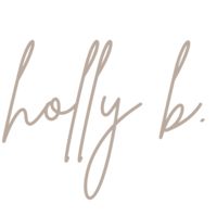 the word holly b is written in cursive handwriting