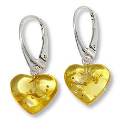 Amber Extraordinaire Leverback Heart Drop Earrings  Bold and aglow, the heart-shaped amber dangling from this earring is a stunning way to wear your love for the ancient tree resin. Treat yourself to a wonder of the gemstone world.        Each approx.1-3/16"L x 9/16"W     Stamped .925 sterling silver; polished finish      Pierced with leverbacks   Stone Information       All sizes and weights approximate     Honey Baltic Amber: Heart-shaped (13x14mm); collected in Poland     Ombre Baltic Amber: Elegant Yellow Heart Earrings, Yellow Heart-shaped Jewelry For Mother's Day, Yellow Heart-shaped Jewelry, Yellow Heart-shaped Earrings For Gift, Yellow Heart Earrings For Gift, Yellow Heart-shaped Jewelry For Valentine's Day, Yellow Adjustable Jewelry For Valentine's Day, Yellow Heart-shaped Sterling Silver Jewelry, Yellow Jewelry With Heart Charm For Anniversary