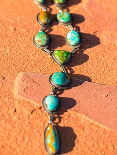 Obviously one of my favorite items to shoot. These necklaces showcase Royston turquoise, the most beautiful mix of ocean blue, forest greens and brilliant copper. Our stones are second to none, we go direct to the mine to choose the stones used to produce these amazing works of art, the best part is we get first choice at the mine! Hand-picked to create a unique, heirloom quality piece that you will enjoy for years to come. Gem quality turquoise set in sterling silver and linked together to lay Southwestern Green Turquoise Gemstone Necklace, Sterling Silver Multi-stone Turquoise Necklace, Artisan Turquoise Multi-stone Necklace, Silver Southwestern Multi-stone Turquoise Necklace, Bohemian Turquoise Multi-stone Pendant Necklace, Royston Turquoise, Lariat Necklace, Link Necklace, Forest Green