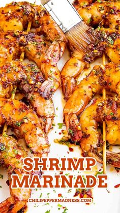 shrimp marinade is being grilled with a spatula