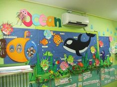 an ocean themed bulletin board in a classroom