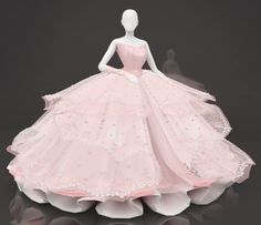 a mannequin dressed in a pink ball gown