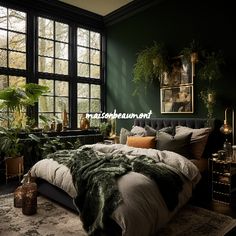 a bedroom with dark green walls and lots of plants in the window sills