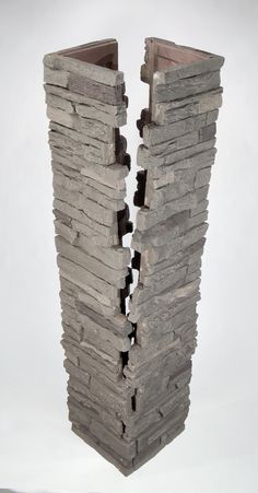 two vases that are made out of bricks