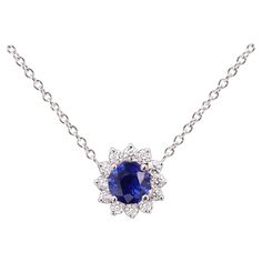 A true brilliant pendant necklace jewelry With a unique round blue sapphire approx size 1.00 carat (6.0 mm) AAA The sapphire is a Natural common heated with a deep Blue color and Good Luster. The round shape sapphire is an uncommon shape for jewelry, usually they are made with oval shapes. High quality Natural Diamonds total 0.30 carat F-VS 14k white gold approx 4.0 grams. adjustable chain all sizes between 16' - 18' inch. +Gift Box