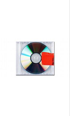 an empty cd case with a red label on it