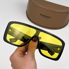 Burberry Be4401u 300185 Sunglasses Black Yellow Shield Unisex Be 4401u Brand New And 100% Authentic! Made In Italy. Same/Next Day Shipping! Brand: Burberry Model Number: Be4401u / Be 4401u Color Code: 300185 Gender: Men / Unisex Frame Shape: Shield Frame Color: Black Frame Material: Injected Frame Type: Full Rim Lens Color: Yellow Lens Material: Polyamide Bio Lens Protection: Category 3 Size: 130x0x130 100% Uv Protection Full Retail Burberry Set Includes: 1. Glasses 2. Hard Case 3. Carrying Clot Frames For Round Faces, Ar Glasses, 70s Sunglasses, Eyes Game, Burberry Models, Cloth Pouch, Fashion Eye Glasses, Mens Trendy Outfits, Burberry Accessories