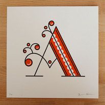 the letter a is made up of red and white shapes with dots on it's edges