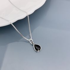 "Tiny and Dainty Sterling Silver Black Onyx Drop Pendant on Sterling Silver Box Necklace Chain Pendant size: 12 mm Please see second photo for size reference Necklace Length: Available in different sizes. Please sizing chart and select length preference from drop down list Comes beautifully gift packaged with an optional message card. If you want the item gift packaged with a message card, please type your message in the \"add your personalization\" box Shipping Policy:  See FAQs below" Necklace Casual, Necklace Everyday, Casual Necklaces, Box Necklace, Black Onyx Necklace, Onyx Necklace, Everyday Necklace, Necklace Box, Silver Box