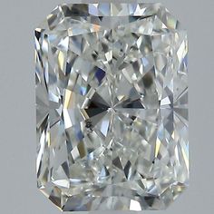 a cushion cut diamond in the shape of a square, on a gray background with white highlights