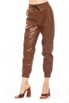 The Axel jogger pant is a must have piece for your wardrobe. This pant features luxe stretch faux leather fabric, loose jogger style pants, fitted leg cuff and drawstring. This item fits true to size. | Alexia Admor Women's Axel Jogger Pants With Fitted Cuff And Waistband, Small Alexia Admor, Leg Cuffs, Faux Leather Fabric, Fashion Joggers, Style Pants, Leather Fabric, Jogger Pants, Must Haves, Faux Leather