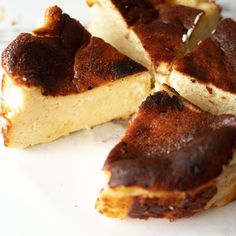 several pieces of cake sitting on top of a white plate