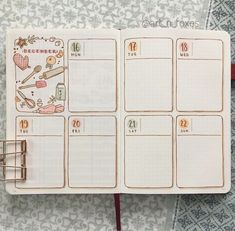 an open planner with stickers on it