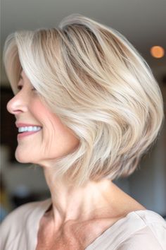 Layered Rounded Bob Hairstyle on smiling older woman with blonde hair, side view. Rounded Bob, A Hairstyle