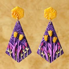 "Handmade floral earrings, rich in details. Unique piece. This pair of earrings is crafted in polymer clay and hand painted. The stud is in gold plated 925 silver.  Size: 2.63x1.25 \" / 6.7x3.2 cm Hand made in Italy by IlQuartoReame." Artistic Purple Earrings For Gift, Handmade Purple Polymer Clay Earrings, Purple Earrings As Mother's Day Gift, Artistic Hand-painted Purple Earrings, Handmade Purple Polymer Clay Flower Earrings, Unique Purple Polymer Clay Earrings, Unique Hand Painted Purple Earrings, Artistic Purple Dangle Earrings, Purple Flower-shaped Earrings