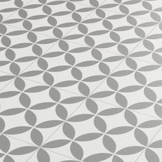 a white and grey wallpaper with circular shapes on it's surface, as well as lines in the background