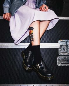 This the 8065: a quintessential schoolgirl look reinterpreted with uncompromising Dr. Martens style, like decorative broguing and double straps with horseshoe buckles.  Woman's Mary Jane style Two adjustable buckle straps Made with classic Doc's DNA, including grooved edges and visible stitching Built on the iconic Dr. Martens air-cushioned sole, which is oil and fat resistant with good abrasion and slip resistanceUpper:100% LeatherLining:55% Leather, 45% TextileSole:100% PVC 8065 Shoe, Jadon Hi, Mary Jane Outfit, Dr Martens Outfit, Leather Mary Jane Shoes, Martens Style, Girl Grunge, Dr Martens Womens, Visible Stitching