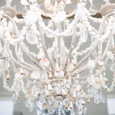 a white chandelier hanging from the ceiling