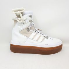 100% Authentic, brand new in original box Adidas x Ivy Park Super Sleek Boot  (GX2782) Women's shoes/boots Color: White / Core White / Off-White Women's Size: 10.5 US     (9 UK, 43 1/3 EUR, 27.5 CM) Items will ship on the first business day after receipt of payment with both tracking and insurance. Please allow up to 10 business days for delivery to the United States or Canada. Adidas Ivy Park, Adidas X Ivy Park, Adidas Super, First Business, Platform Shoe, White Shoes Sneakers, Exclusive Shoes, White Core, Ivy Park