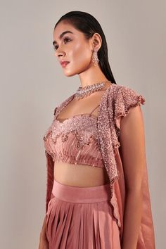 Pink sheer cape with sequin embroidered wave patterns. Comes with padded gradient sequin embroidered blouse and draped skirt. - Aza Fashions Evening Sets With Cape Sleeves, Evening Set With Cape Sleeves, Elegant Fitted Choli With Cape Sleeves, Fitted Outerwear With Traditional Drape For Party, Fitted Cape Set For Receptions, Fitted Cape Set For Wedding, Evening Choli With Fitted Cape Sleeves, Formal Festive Cape Set, Fitted Lehenga With Cape Sleeves