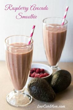 raspberry chocolate smoothie in two glasses with strawberries and avocados