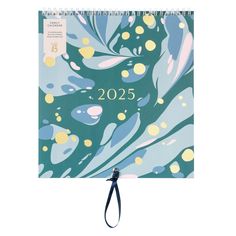 a blue and yellow spiral notebook with the number 205 on it's front cover