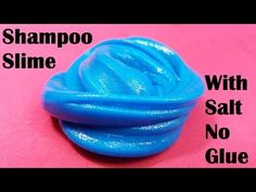 a blue soap ball sitting on top of a pink surface with the words shampoo slime