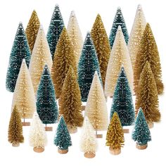 small christmas trees are lined up in rows