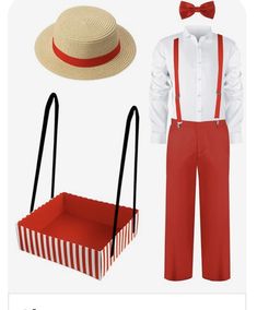 a man wearing red pants, white shirt and straw hat next to an orange box